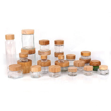 Glass container jar for cosmetic honey jam with bamboo wooden lid